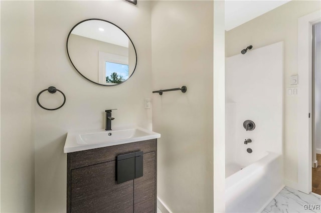 bathroom with vanity and shower / bathing tub combination