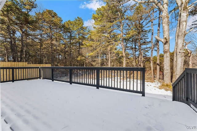 view of snow covered deck