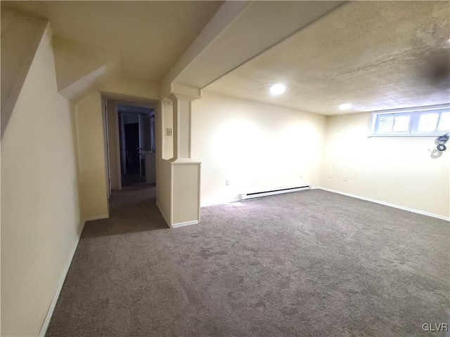 interior space with dark carpet, a textured ceiling, and baseboard heating