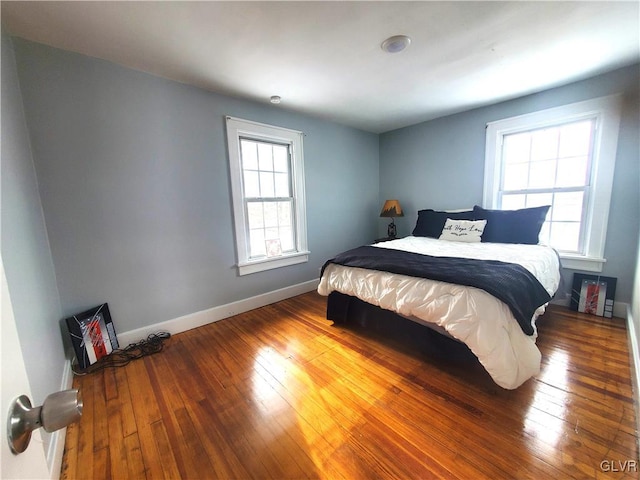 bedroom featuring wood-type flooring