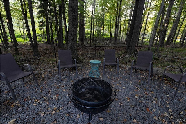 view of patio / terrace with an outdoor fire pit