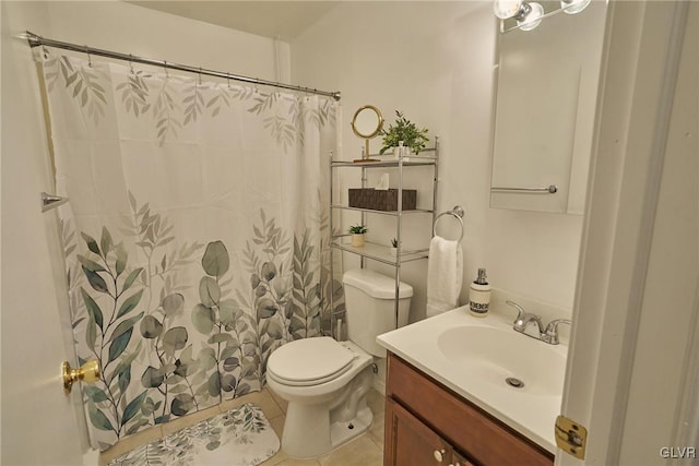 bathroom featuring vanity, tile patterned flooring, toilet, and a shower with shower curtain