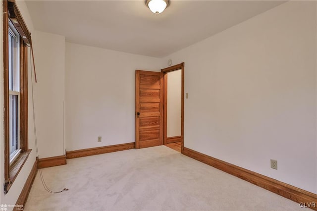 unfurnished room with carpet