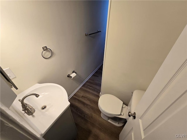 bathroom featuring sink and toilet