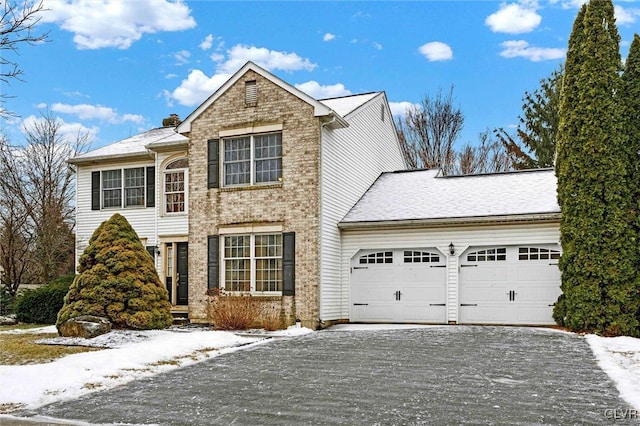 front facade with a garage