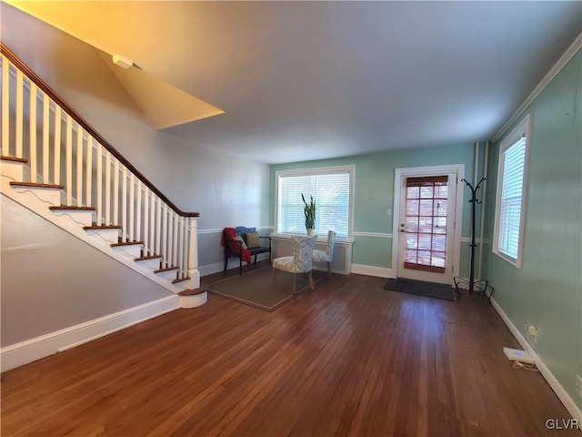 foyer with dark hardwood / wood-style flooring