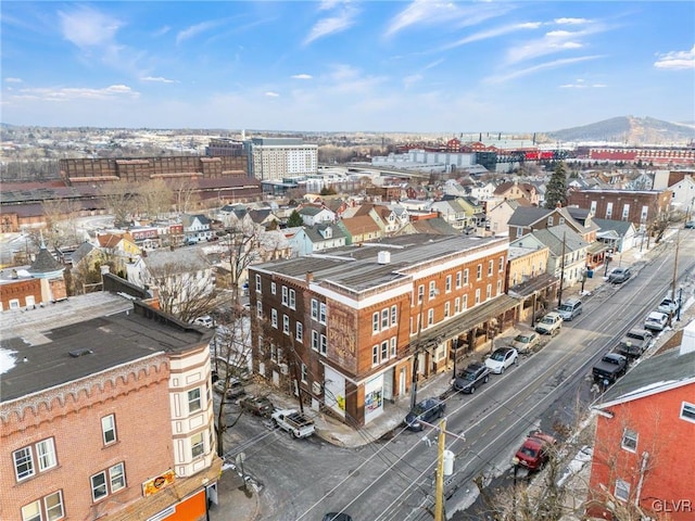 birds eye view of property featuring a mountain view