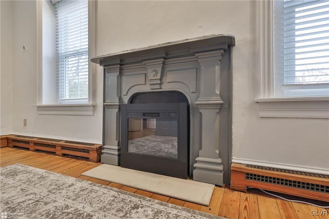 interior details featuring hardwood / wood-style floors