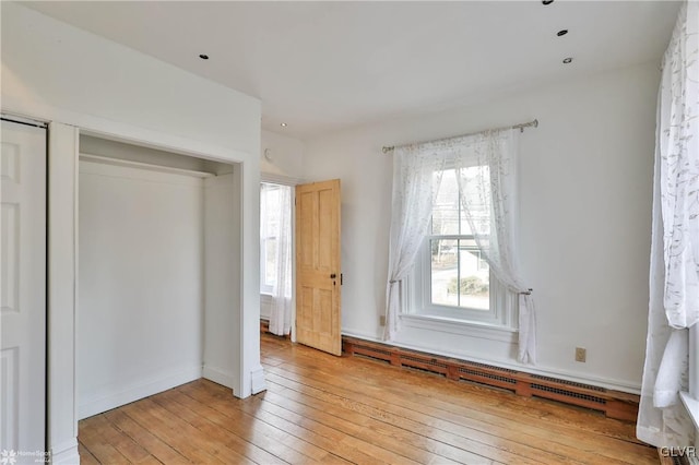 unfurnished bedroom featuring light hardwood / wood-style flooring