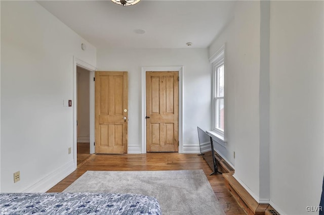 bedroom featuring hardwood / wood-style floors