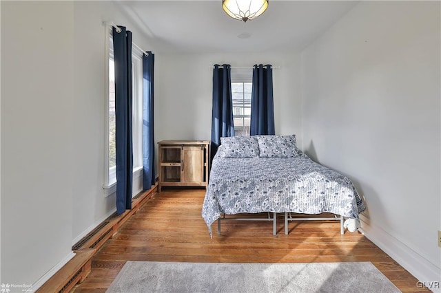 bedroom featuring hardwood / wood-style floors