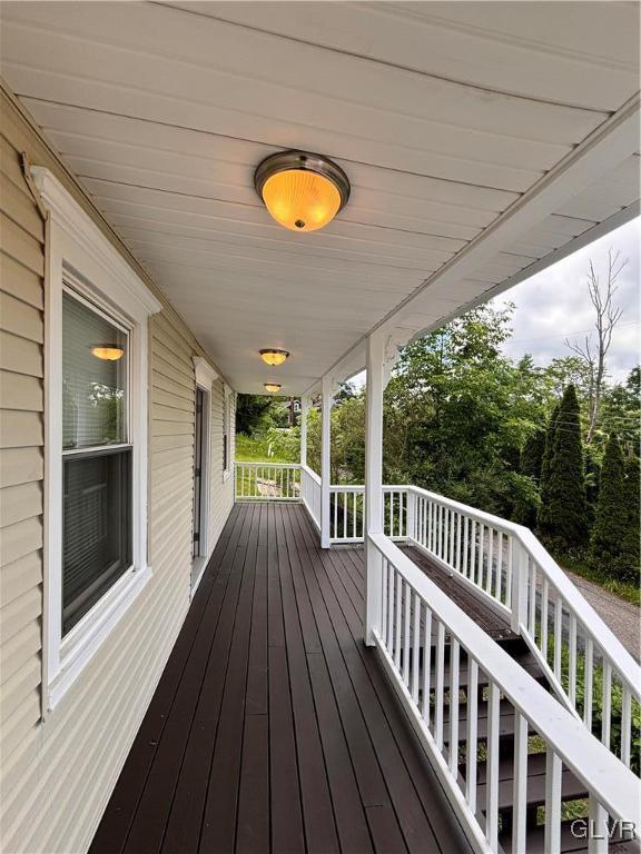 deck featuring covered porch