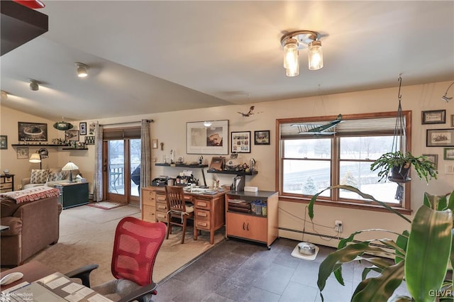 office with vaulted ceiling and a baseboard heating unit