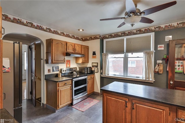 kitchen featuring stainless steel appliances and ceiling fan