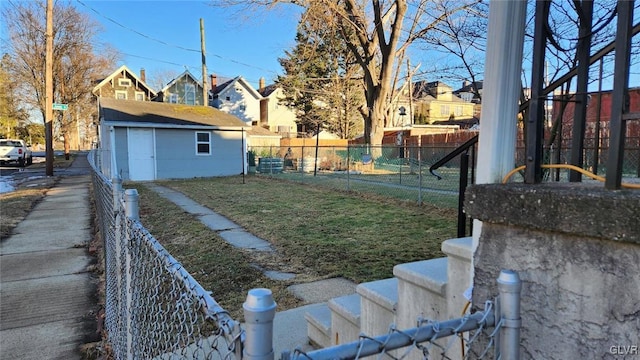 view of yard with an outdoor structure