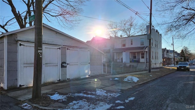 view of front of home with an outdoor structure