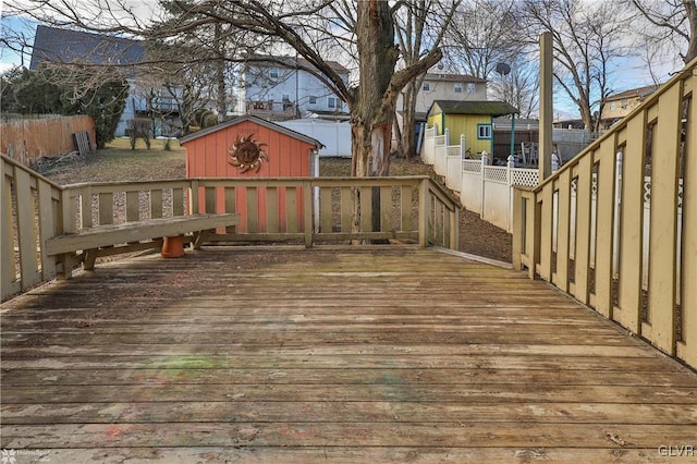 wooden deck with a storage unit