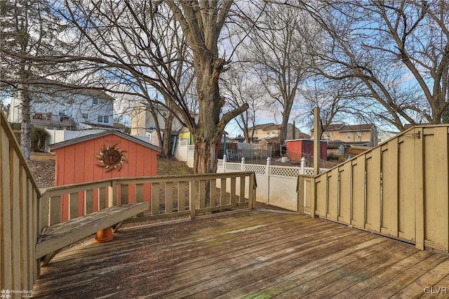 wooden deck with an outdoor structure