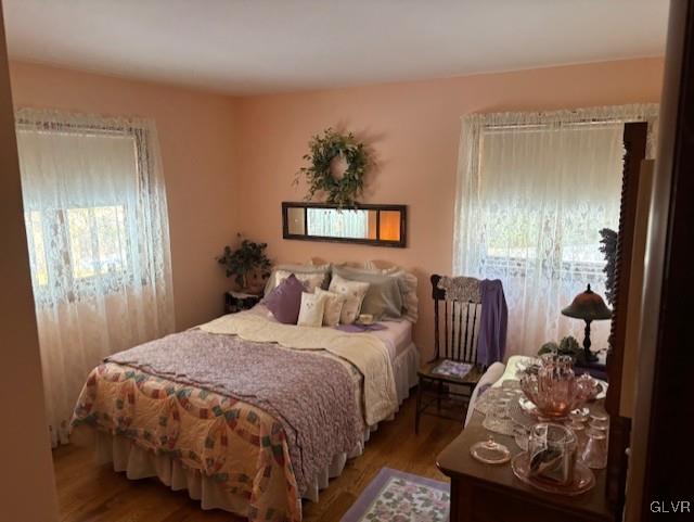 bedroom featuring hardwood / wood-style floors