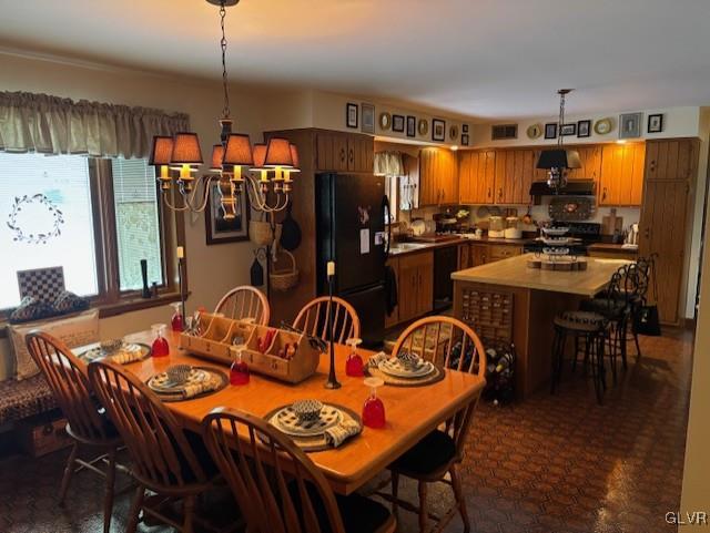 dining room featuring an inviting chandelier