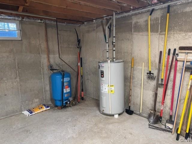 utility room with electric water heater