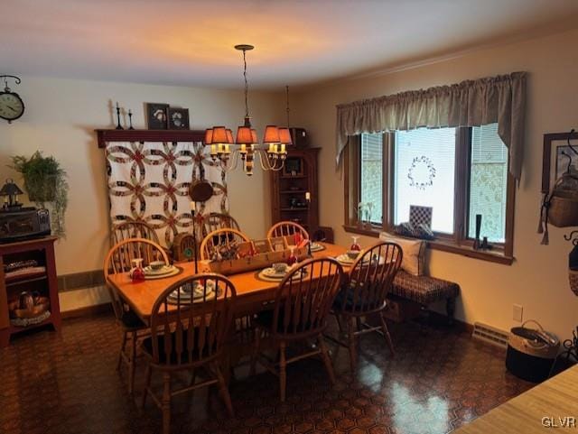 dining room featuring a notable chandelier