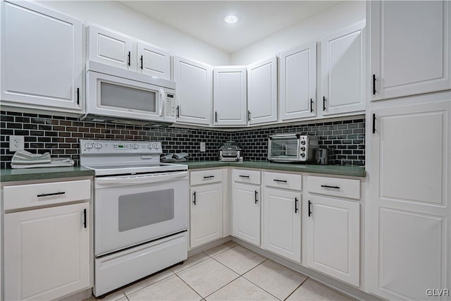 kitchen featuring white cabinetry, light tile patterned flooring, backsplash, and white appliances