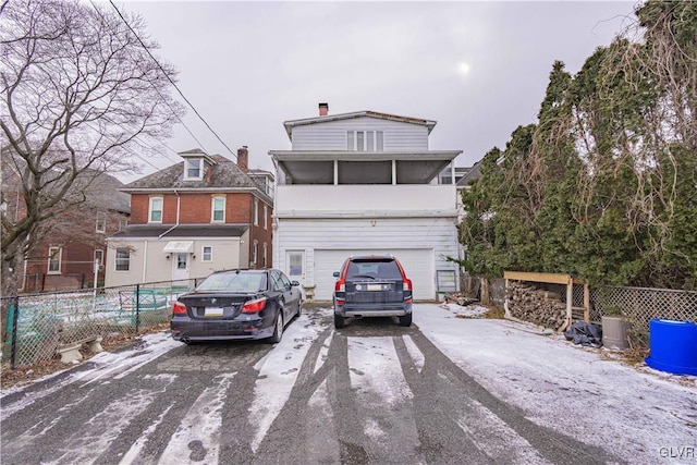 view of property featuring a garage