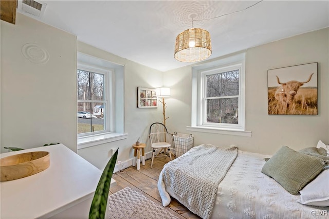 bedroom featuring hardwood / wood-style floors