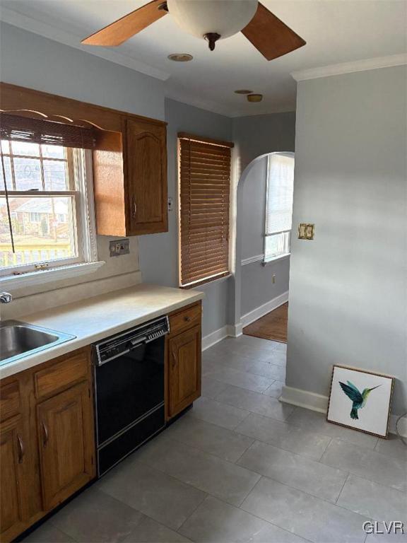 kitchen featuring sink, plenty of natural light, dishwasher, and ceiling fan