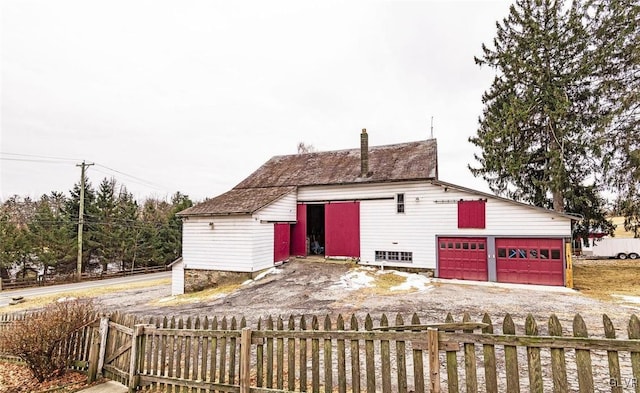 exterior space with a garage