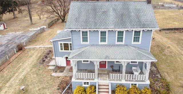 view of front of house with a balcony