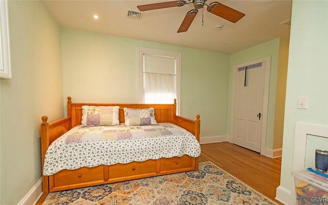 bedroom featuring ceiling fan and light wood-type flooring