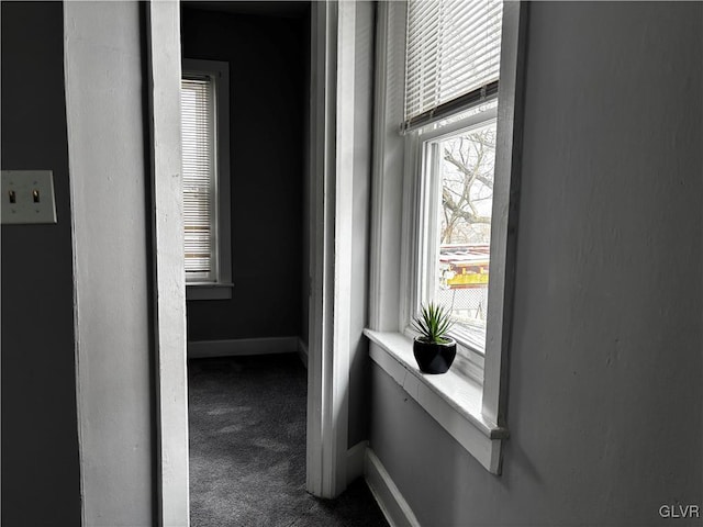 corridor featuring carpet flooring