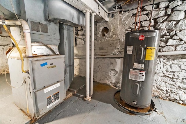 utility room featuring electric water heater and heating unit