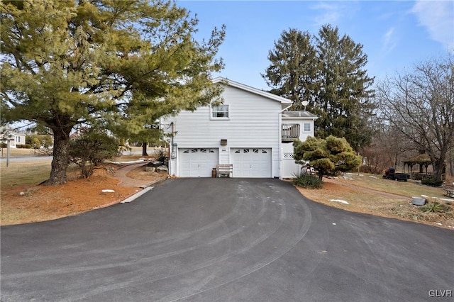 view of home's exterior with a garage