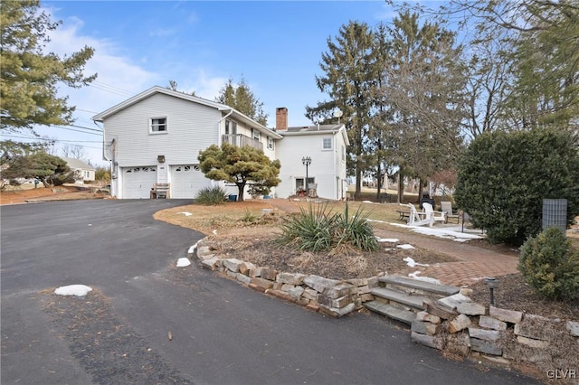 view of home's exterior featuring a garage