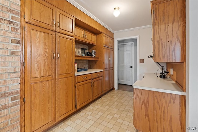 kitchen featuring crown molding