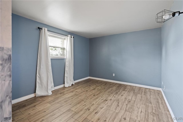 empty room with light wood-type flooring