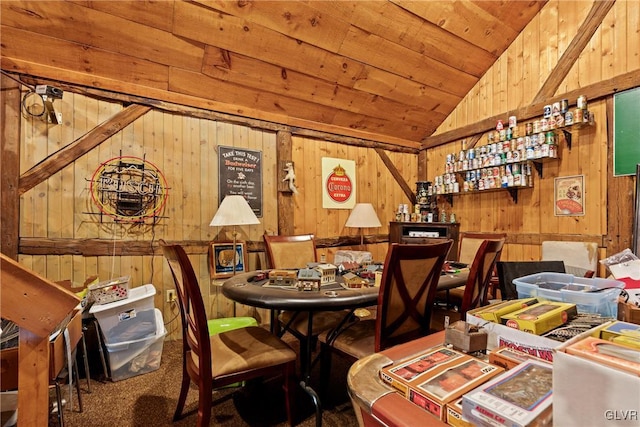 dining room featuring lofted ceiling, bar, and wood walls