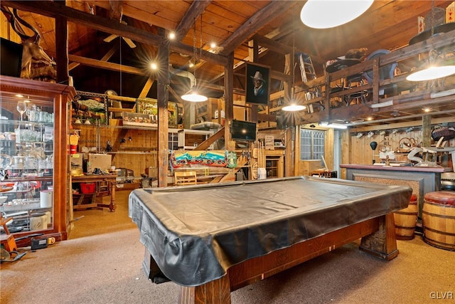 recreation room with beamed ceiling, carpet, wood walls, and billiards