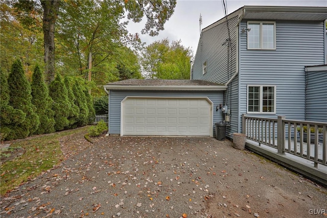 view of property exterior featuring a garage