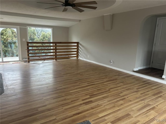 unfurnished room featuring wood-type flooring and ceiling fan