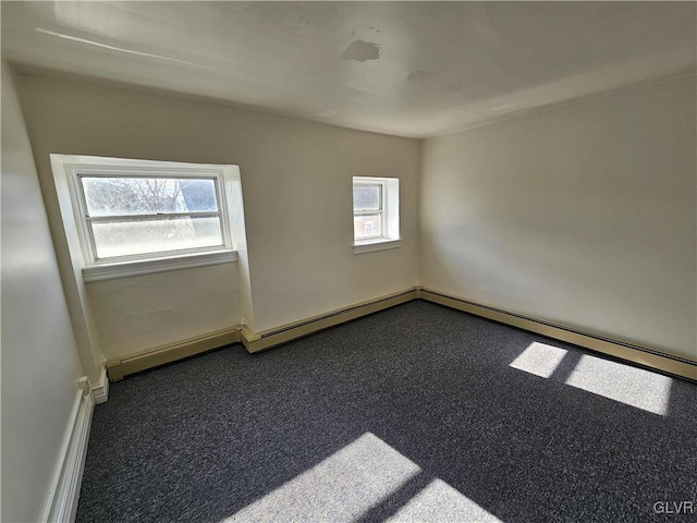 carpeted spare room with plenty of natural light