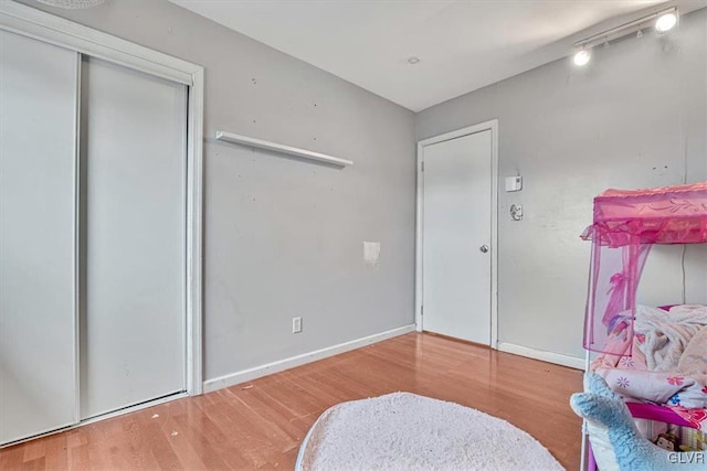 bedroom featuring hardwood / wood-style floors