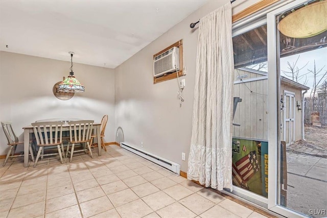 tiled dining area with a baseboard heating unit and a wall mounted air conditioner