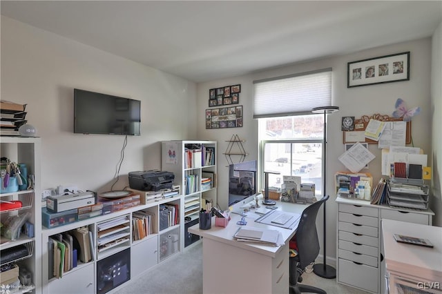 office area with light colored carpet