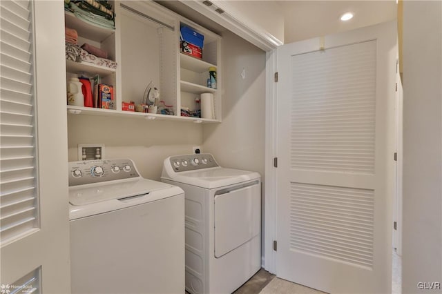 laundry area with washing machine and dryer