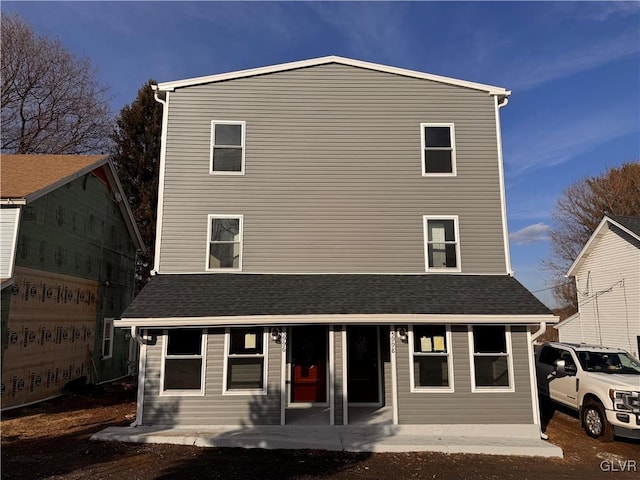 rear view of house featuring a patio