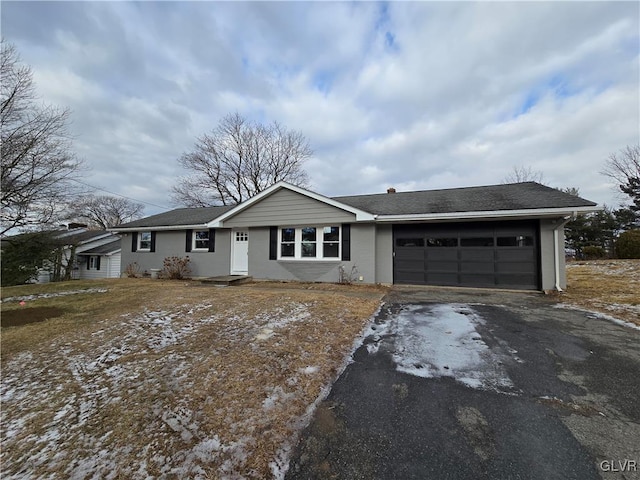 single story home with a garage